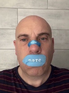 David Purcell wearing a Naze strip and mouth tape