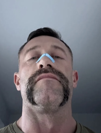 Vinny Craine wearing a Naze strip