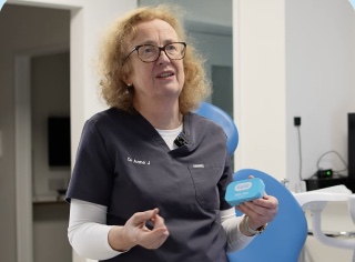 Dentist Dr. Anne O'Donnell holding Naze mouth tape
