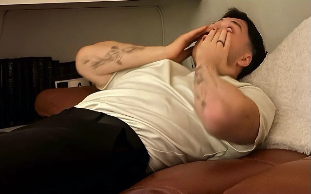 Adam exhausted on the couch